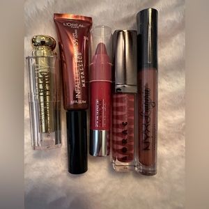 Five new/unused lipsticks